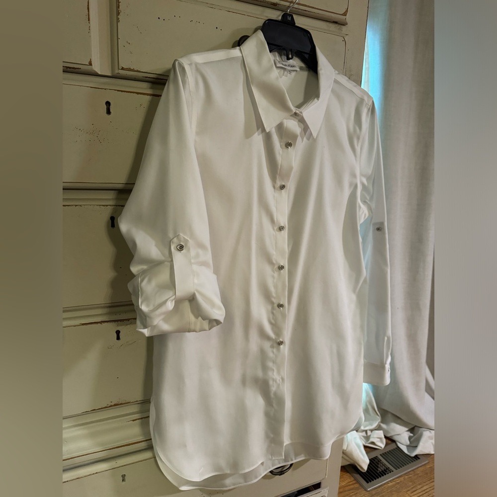 Calvin Klein white Dress shirt with silver buttons.
